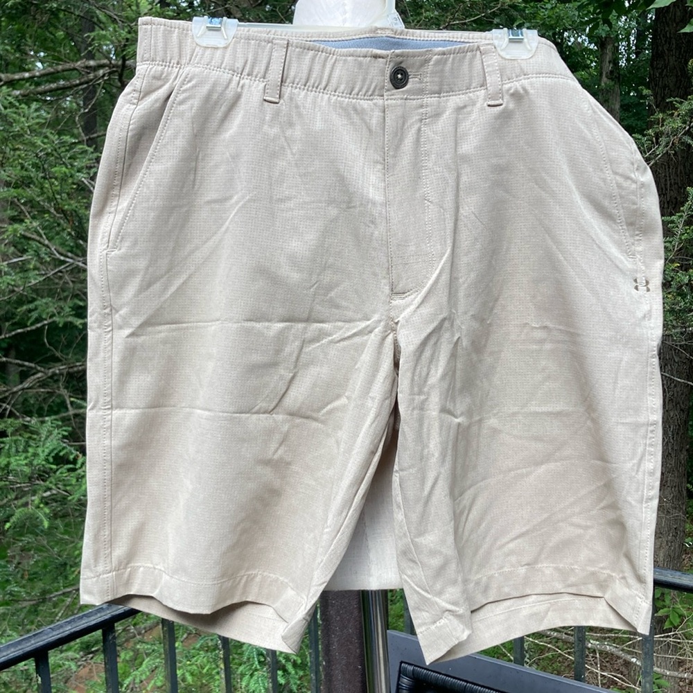 Under Armour tan shorts with logo, button, elastic waist sz. 36